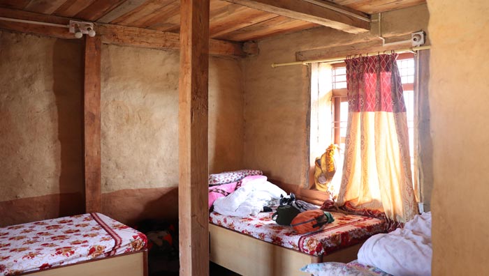 Une chambre dans la maison traditionnelle - Ermitage de Gulmi